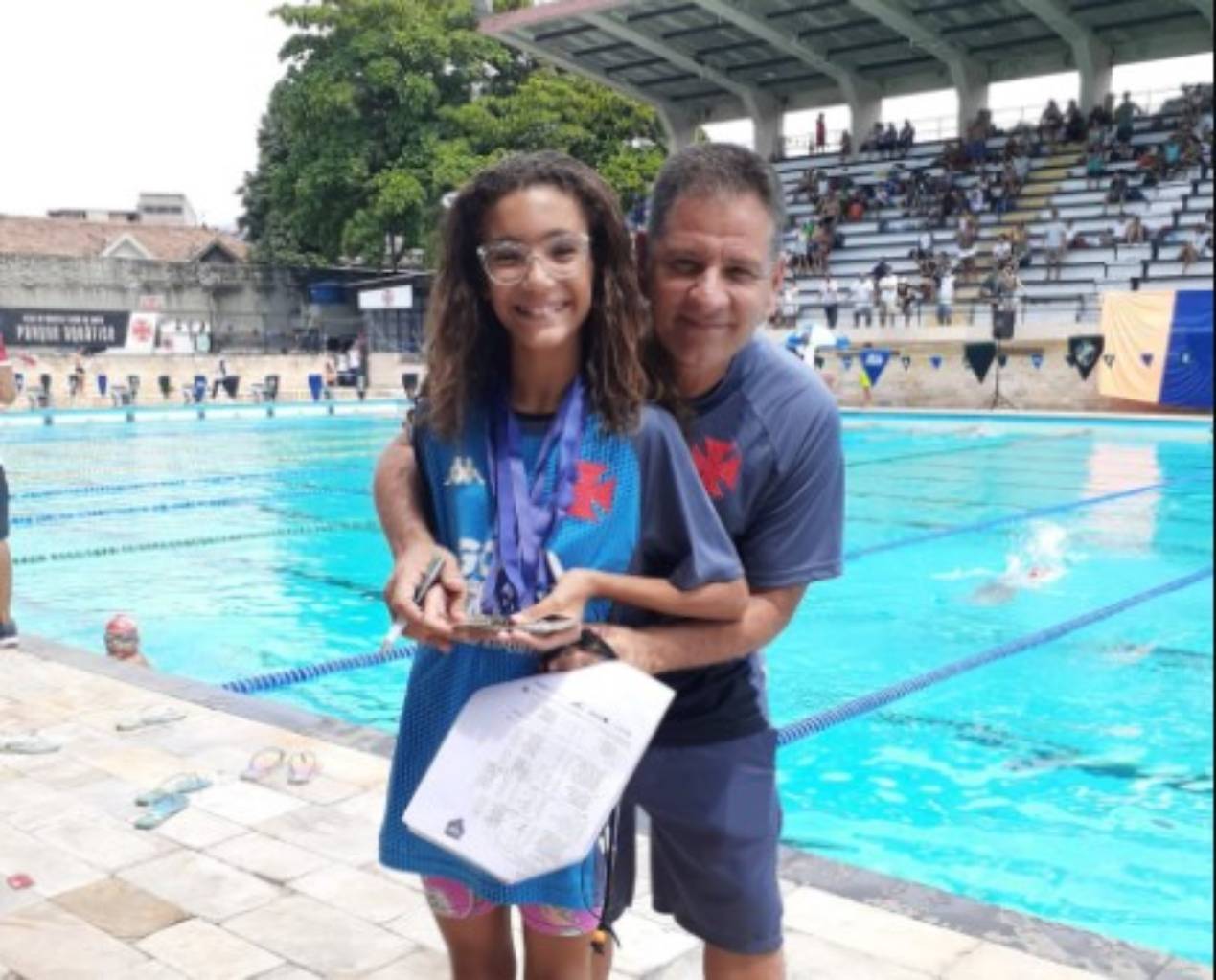 Atleta Milena Ferrai e o técnico Fábio Sampaio